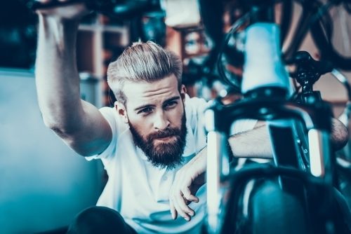 man thinking about what he wants before buying his mountain bike