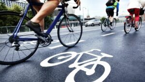 Group of people on road bikes commuting