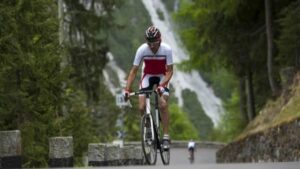 a man riding a road bike