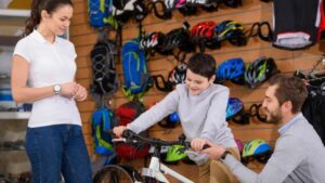 Parents shopping for a bike for their child