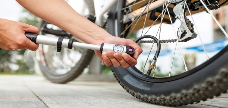 Pumping a bicycle tire